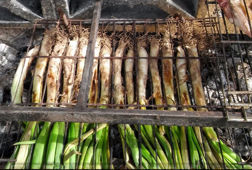 Calçots a la braça